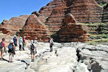 Fly to the Bungle Bungles then hike to the domes