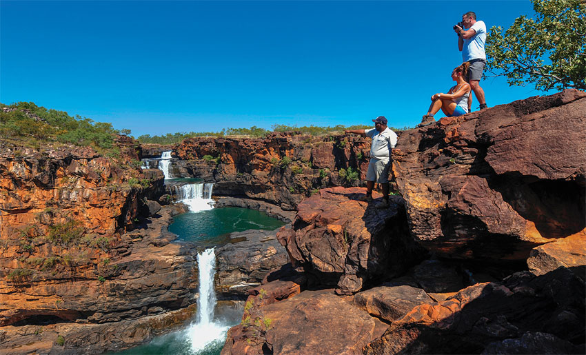 Fly to Micthell Falls airstrip then hike up