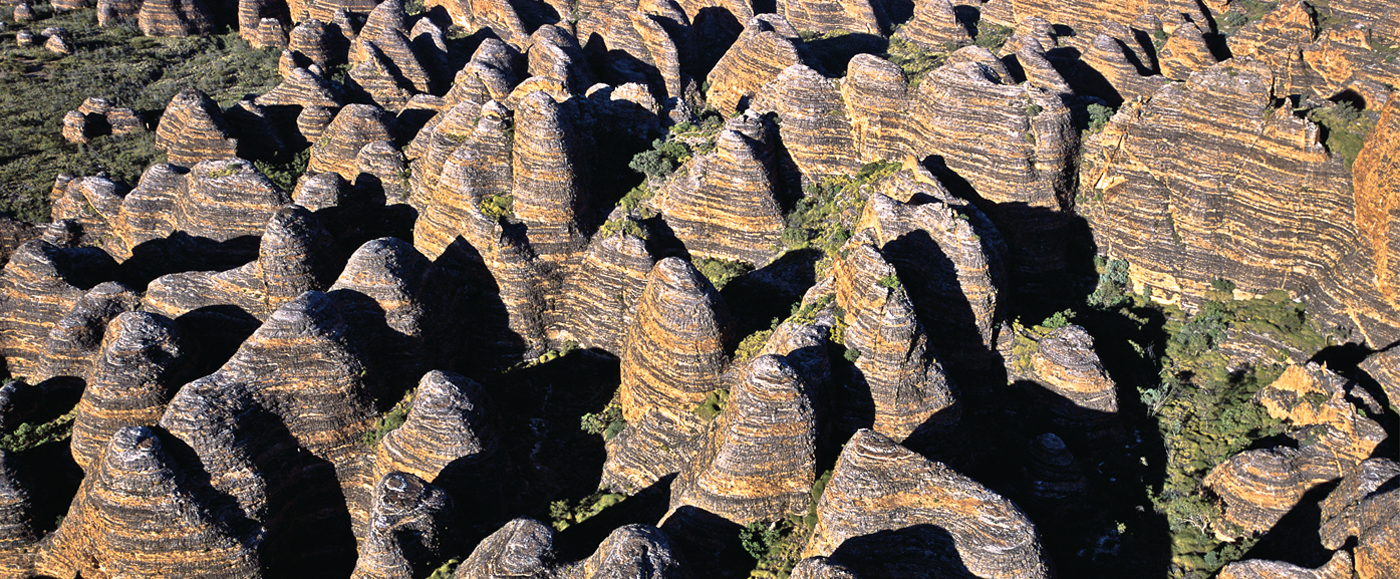 Trek thru the Bungle Bugle gorge after landing from your scenif flight with a local guide